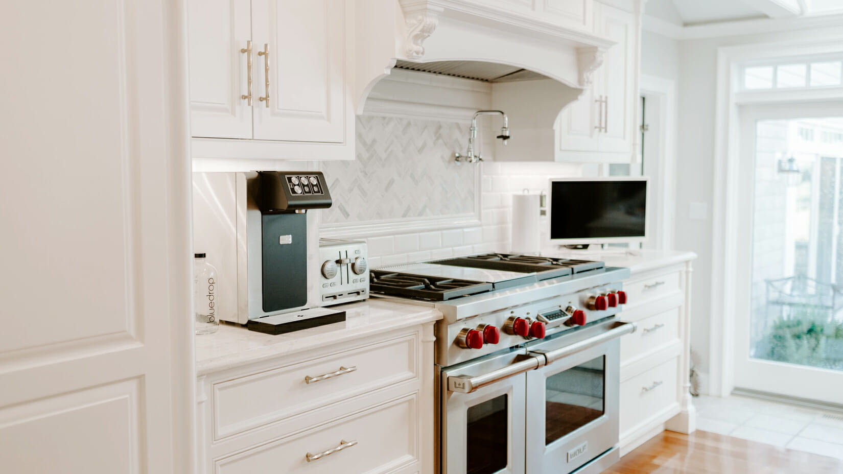 A still and sparkling system on a residential kitchen counter.