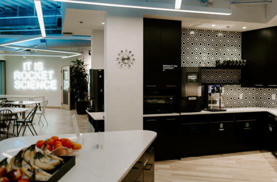 An office kitchen with a bluedrop water product.